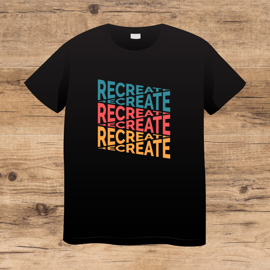 Black t-shirt with 'RECREATE' text in colorful letters on a wooden surface