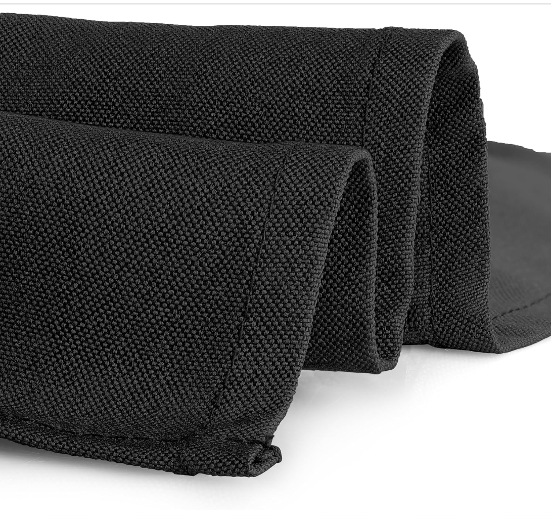 Roll of black fabric on a white background