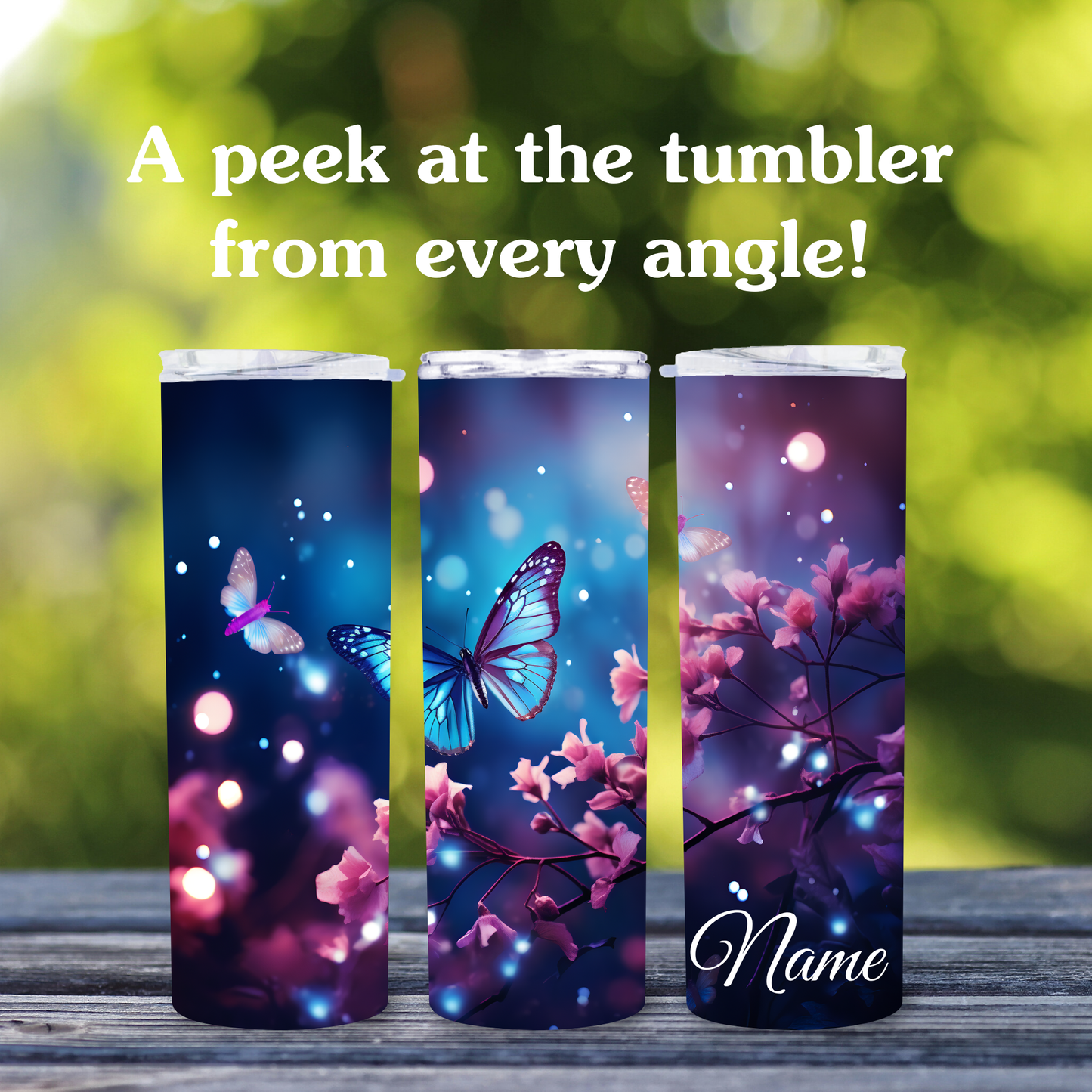 Three tumblers with butterfly and floral designs on a wooden surface with a blurred green background.
