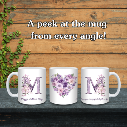 Three white mugs with floral designs and text on a wooden background