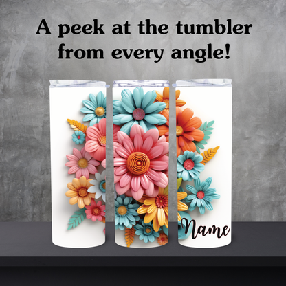 Floral design tumbler with 'name' text on a gray background