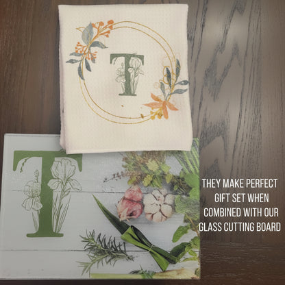 Two fabric items with floral patterns on a wooden surface