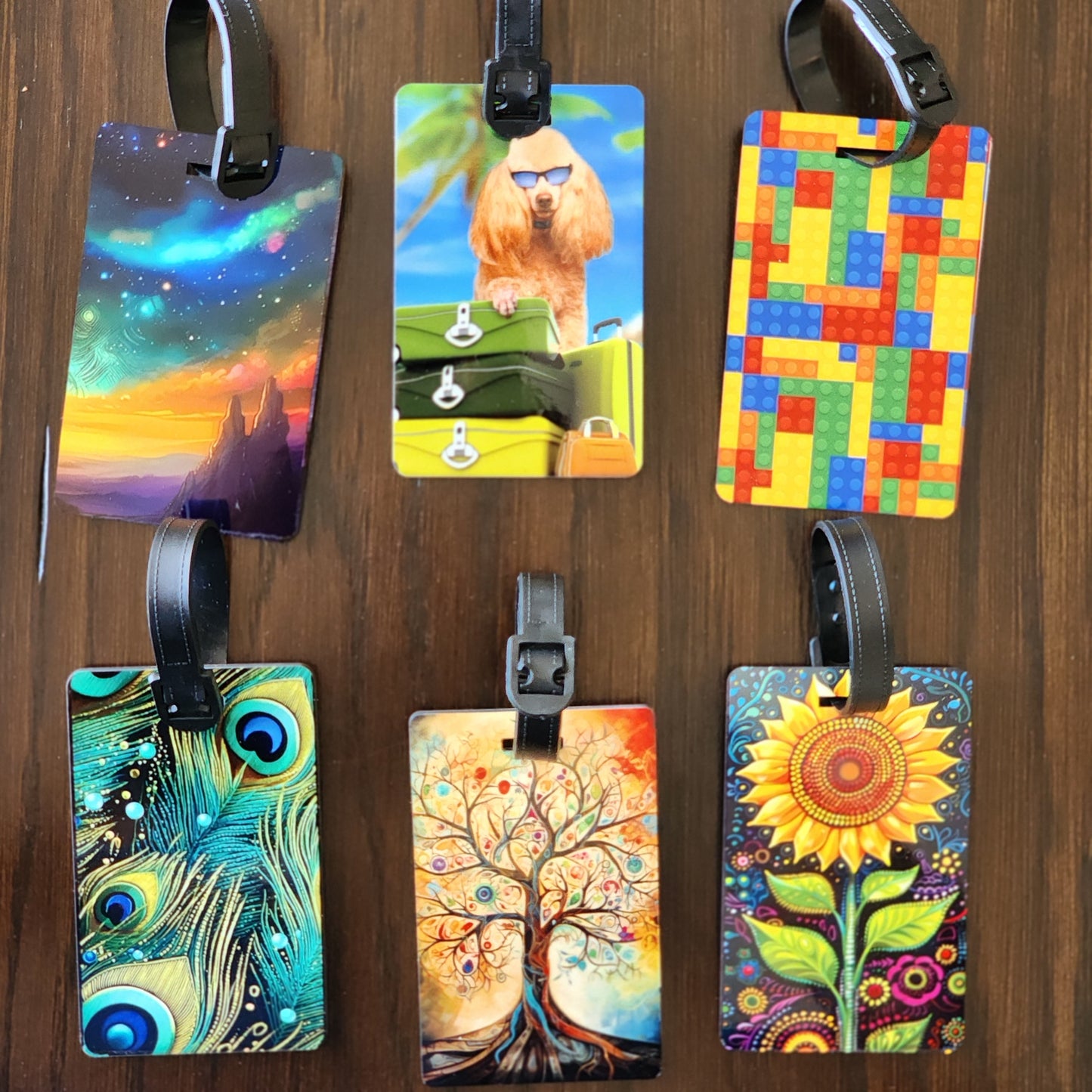 Collection of colorful luggage tags on a wooden surface