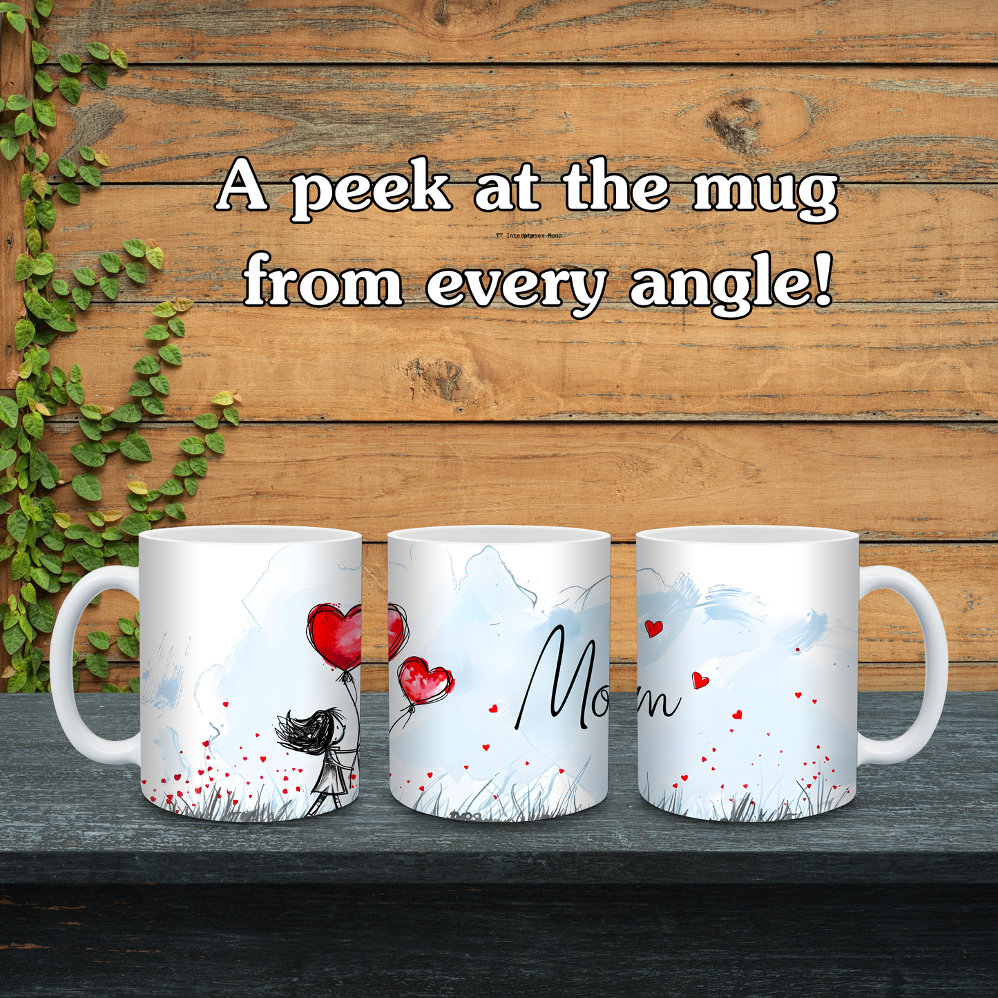 Three mugs with artistic designs and text on a wooden surface with greenery.