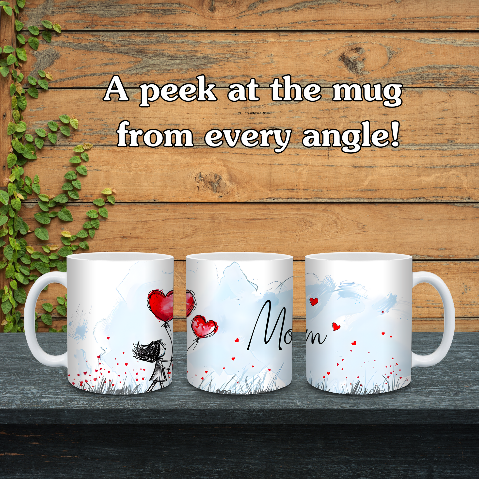 Three mugs with artistic designs and text on a wooden surface with greenery.