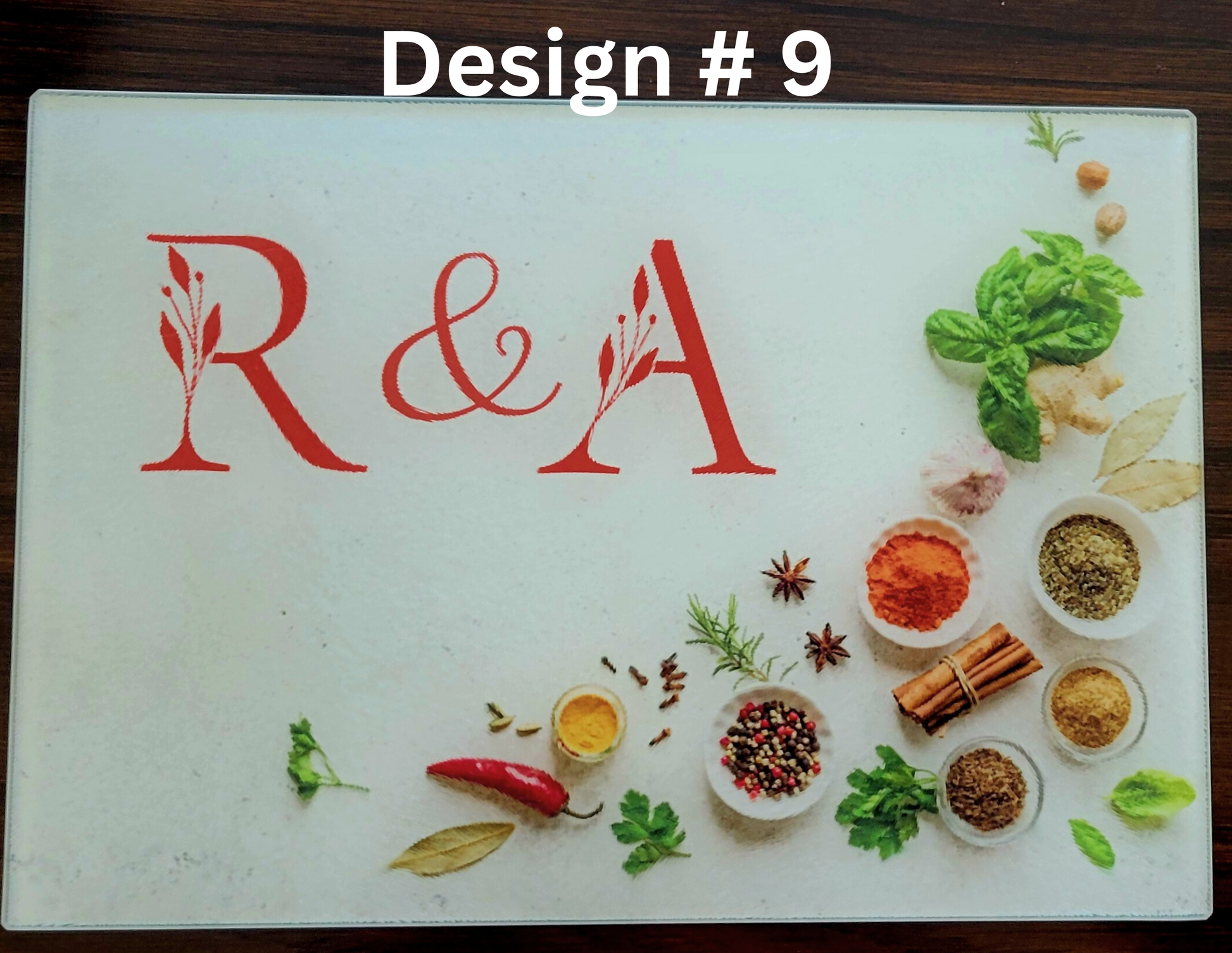 Design 9 with 'R&A' logo and various spices and herbs on a white background