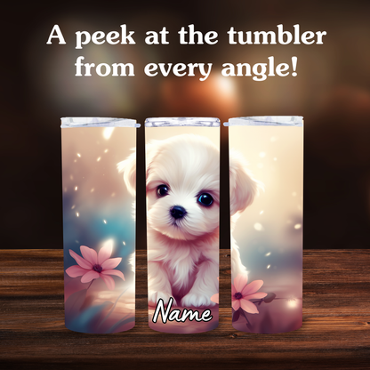 Three tumblers with a puppy design and floral elements on a wooden surface.