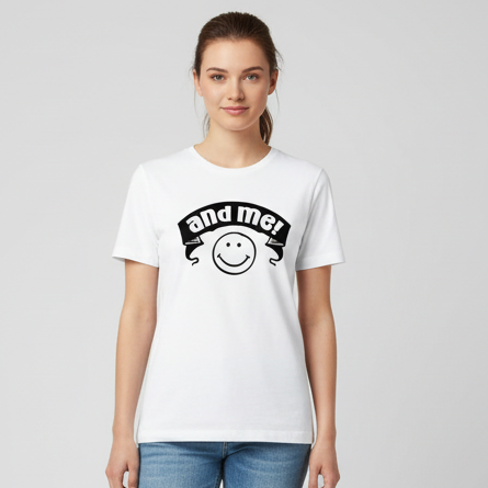 White t-shirt with a black graphic design on a wooden surface