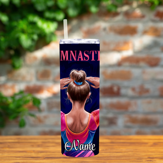 Tumbler with a design of a person in a gymnastics outfit and the word 'Gymnast' on a brick background.