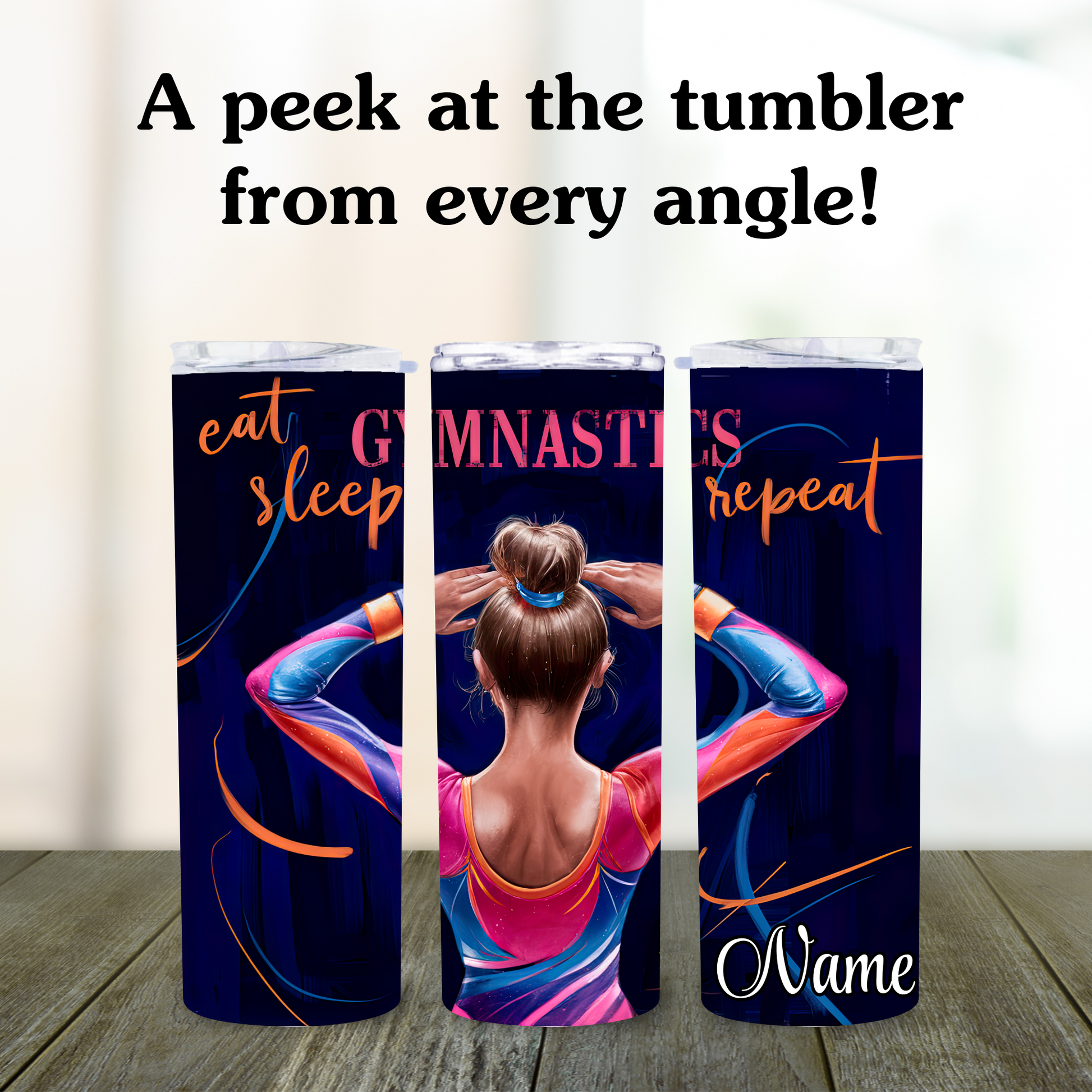 Three tumblers with a gymnast design and text on a wooden surface.