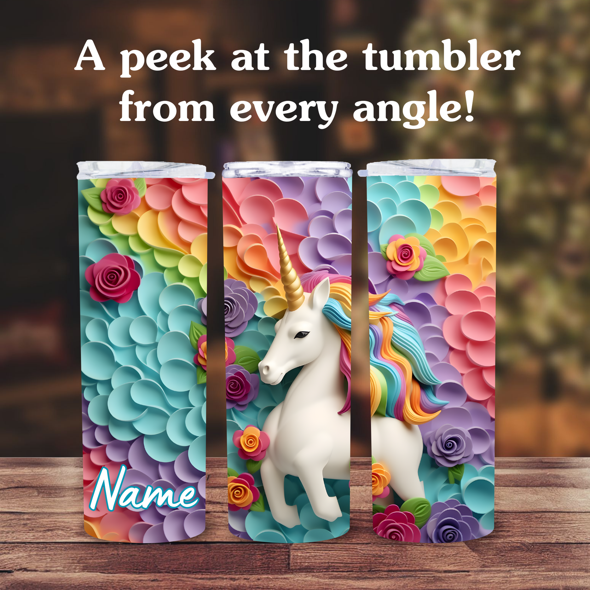 Colorful tumbler with unicorn design on a wooden surface