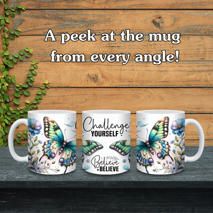 Three mugs with butterfly designs and motivational phrases on a wooden surface.