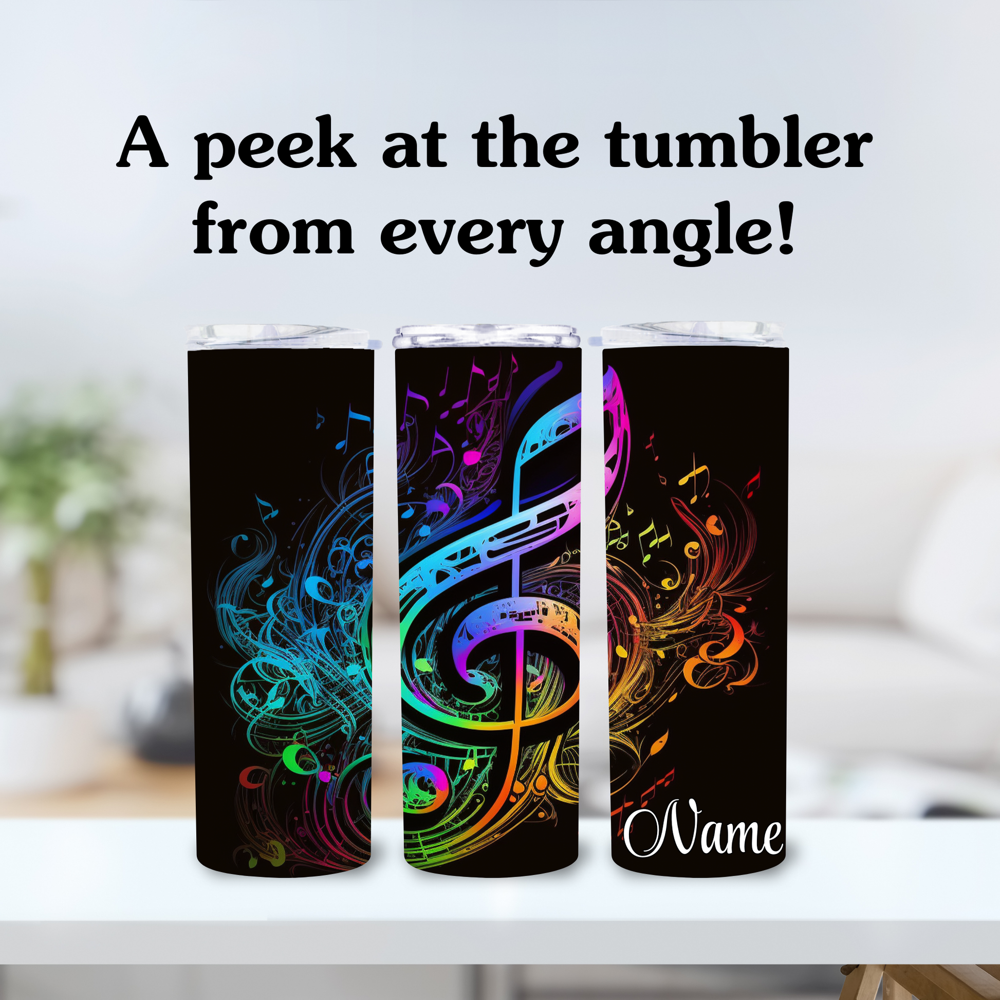 Three tumblers with colorful music note designs on a white surface.