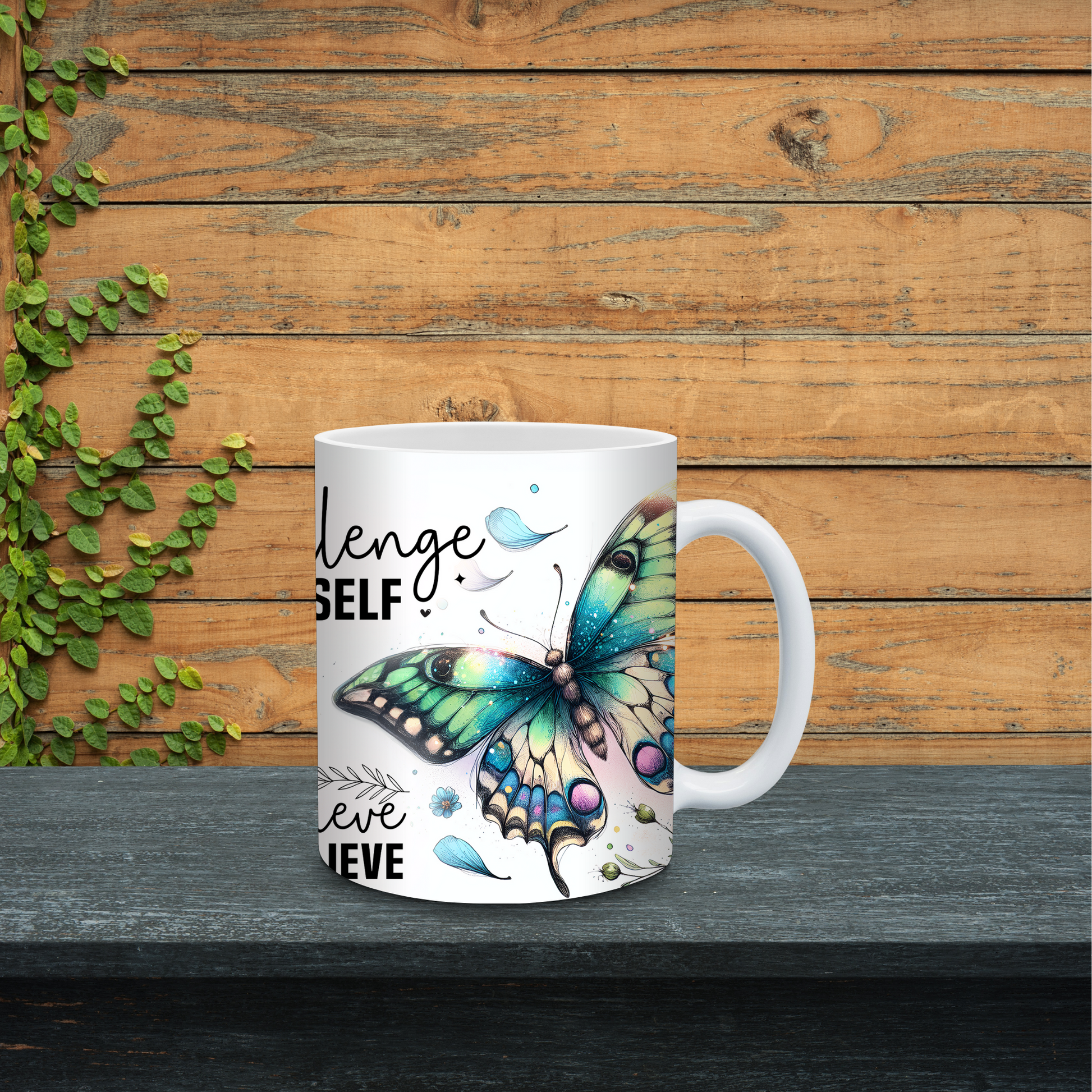 Mug with butterfly design and motivational text on a wooden surface