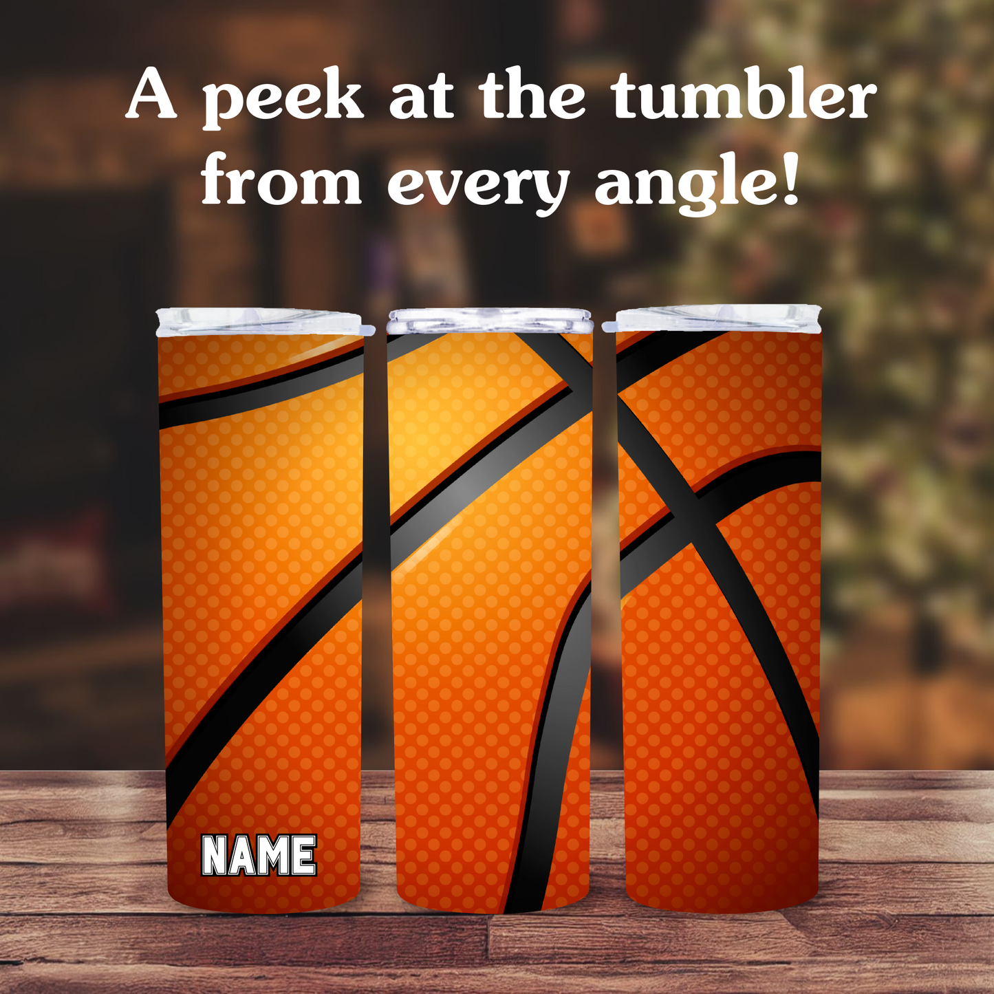 Three orange tumblers with basketball design on a wooden surface.