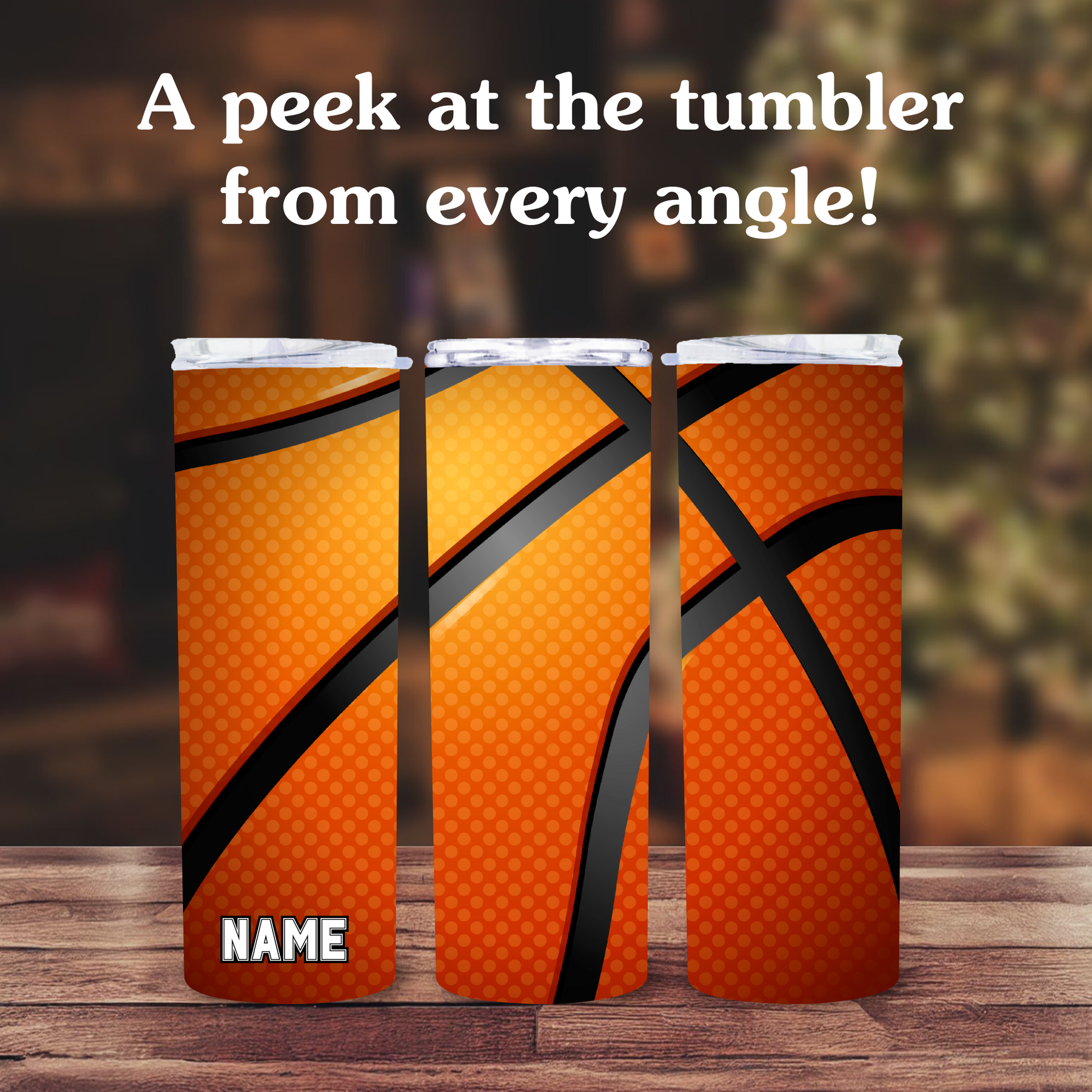 Three orange tumblers with basketball design on a wooden surface.