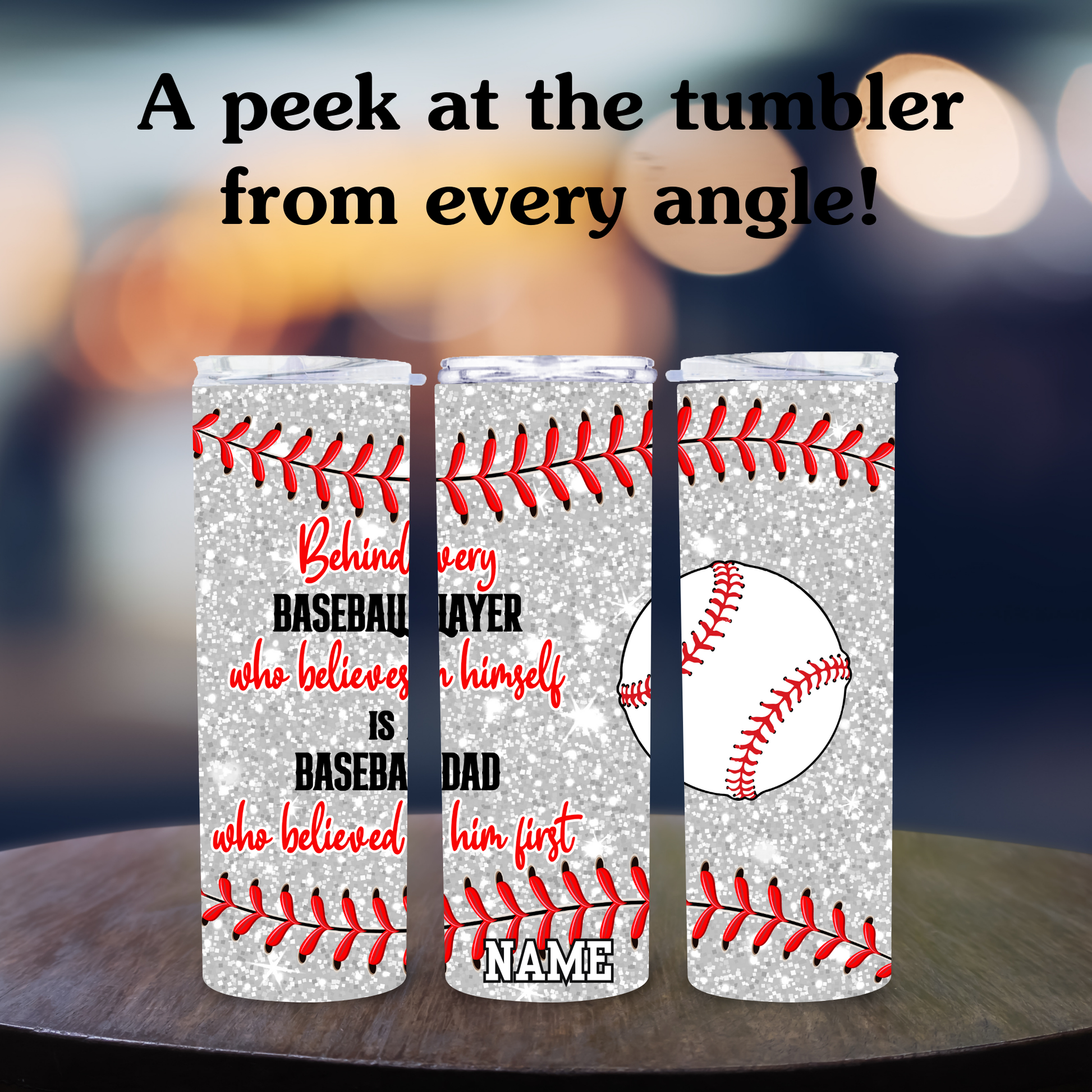 Three tumblers with baseball design and text on a wooden surface.