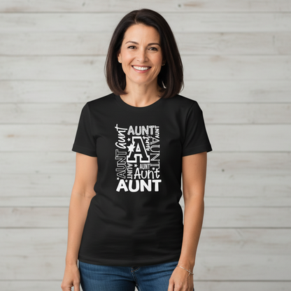 Woman wearing a black t-shirt with 'Aunt' text design against a light wooden panel background
