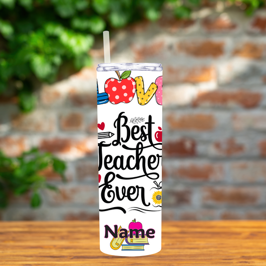 Tumbler with 'Best Teacher Ever' design on a wooden surface with a blurred brick wall background
