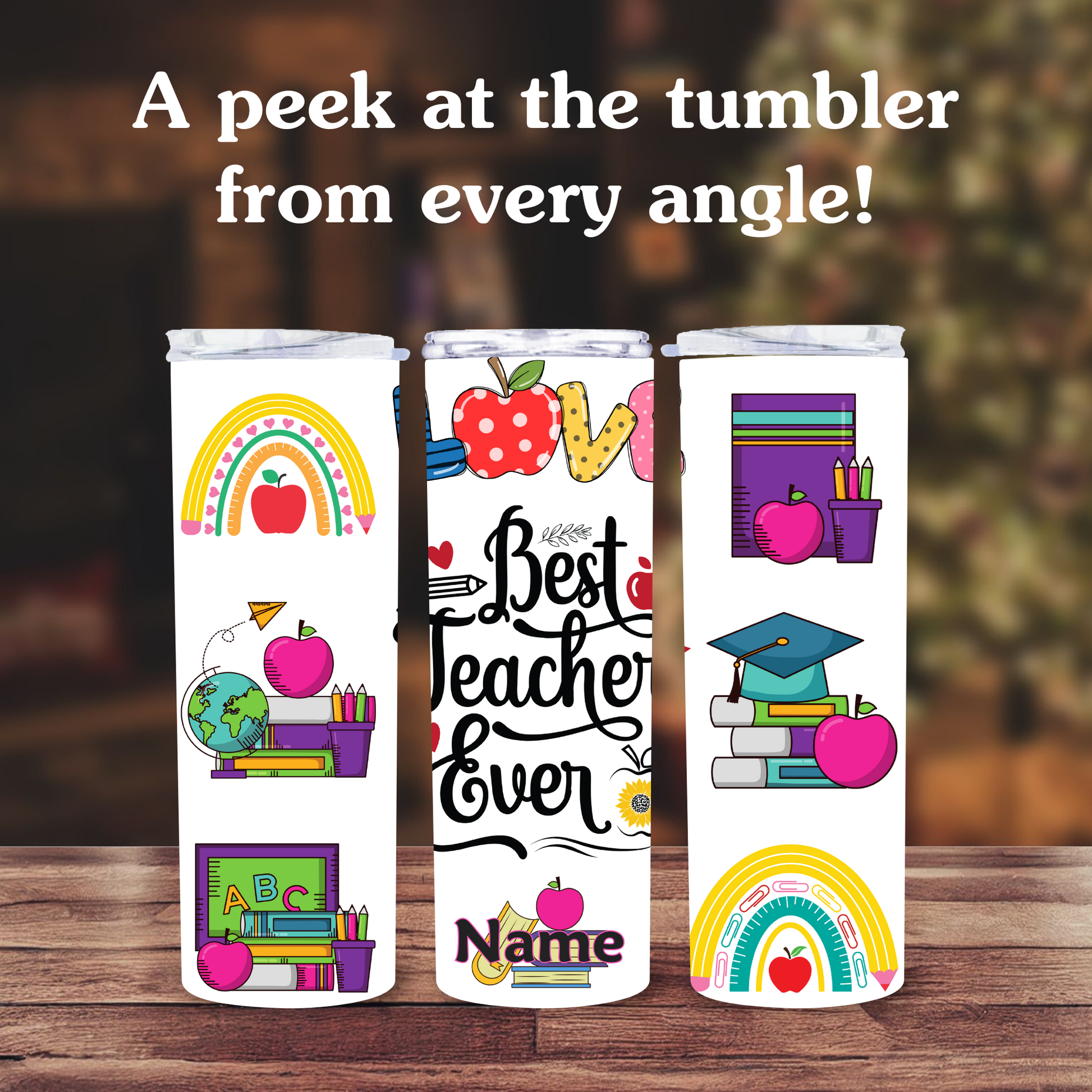 Three tumblers with educational-themed designs on a wooden surface.