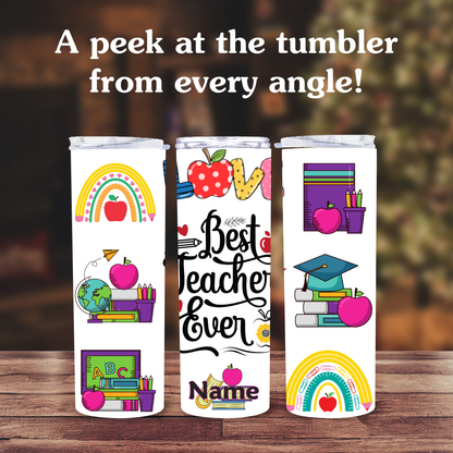 Three tumblers with educational-themed designs on a wooden surface.