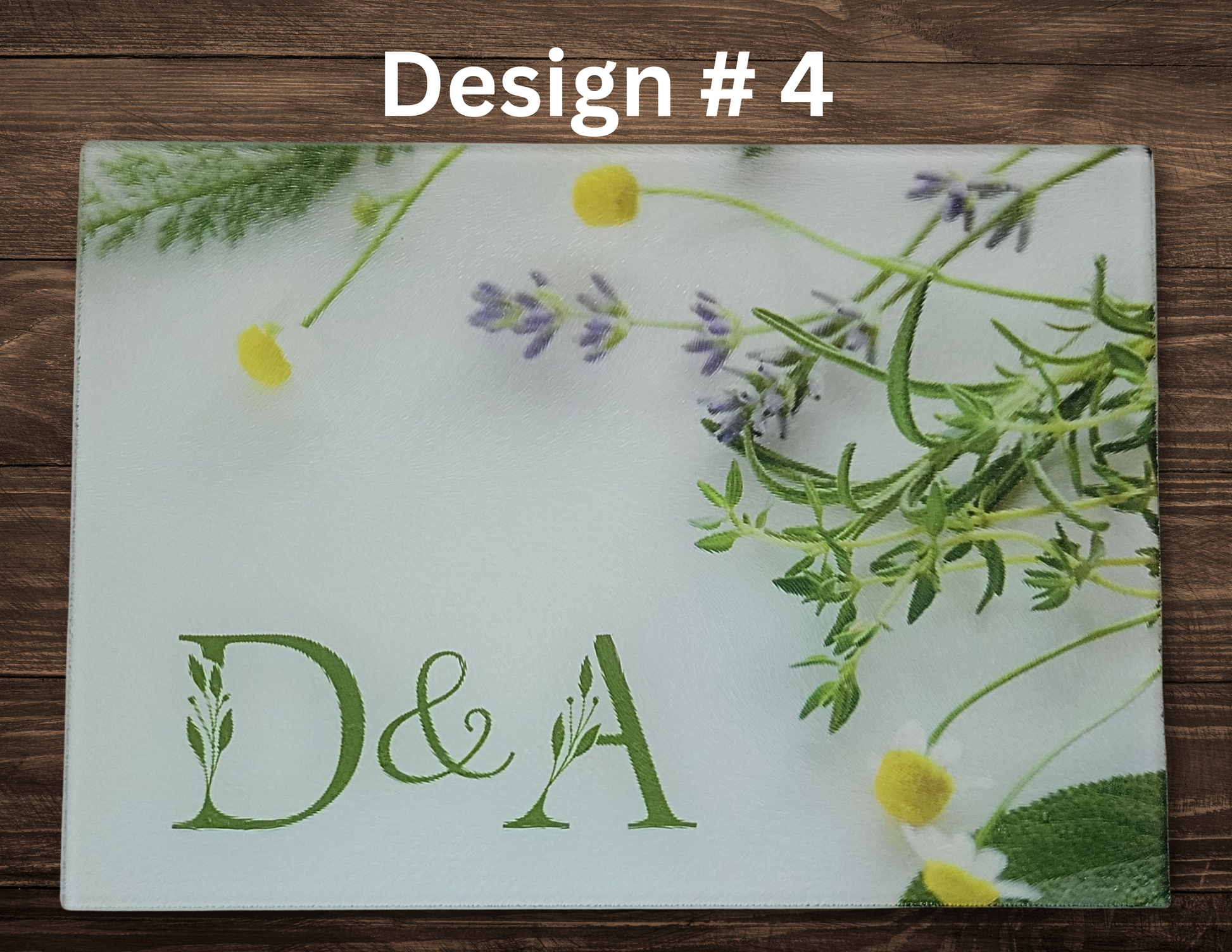 Decorative mat with floral design and 'D&A' initials on a wooden surface