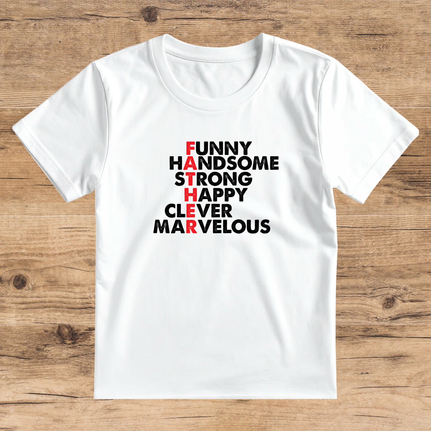 White t-shirt with motivational text on a wooden surface