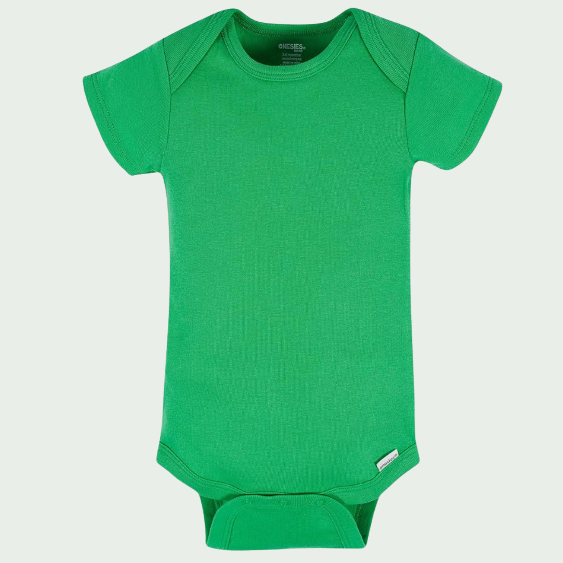 Green baby onesie on a light gray background