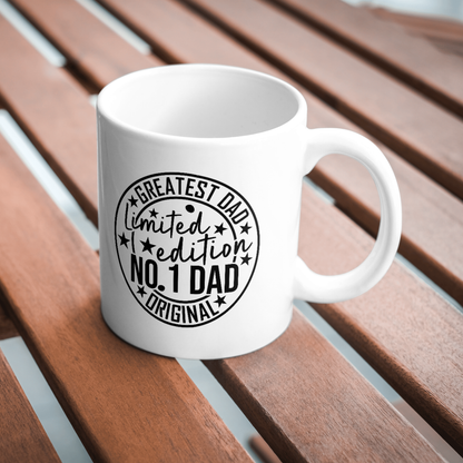 White mug with black text on a wooden surface