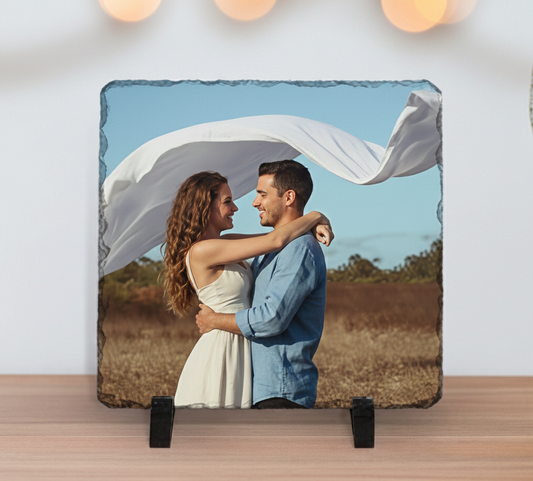 Personalized photo slate of a couple embracing with a blue sky background
