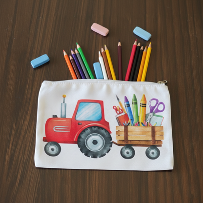 Pencil case with a custom print of red tractor design filled with stationery items