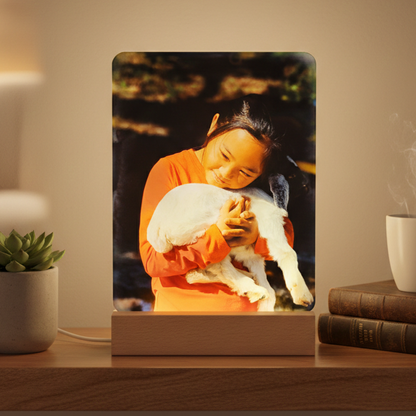 Table lamp with a custom photo on a wooden base.