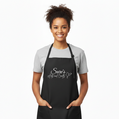 Person wearing a black apron with 'Sarv's' branding on a white background