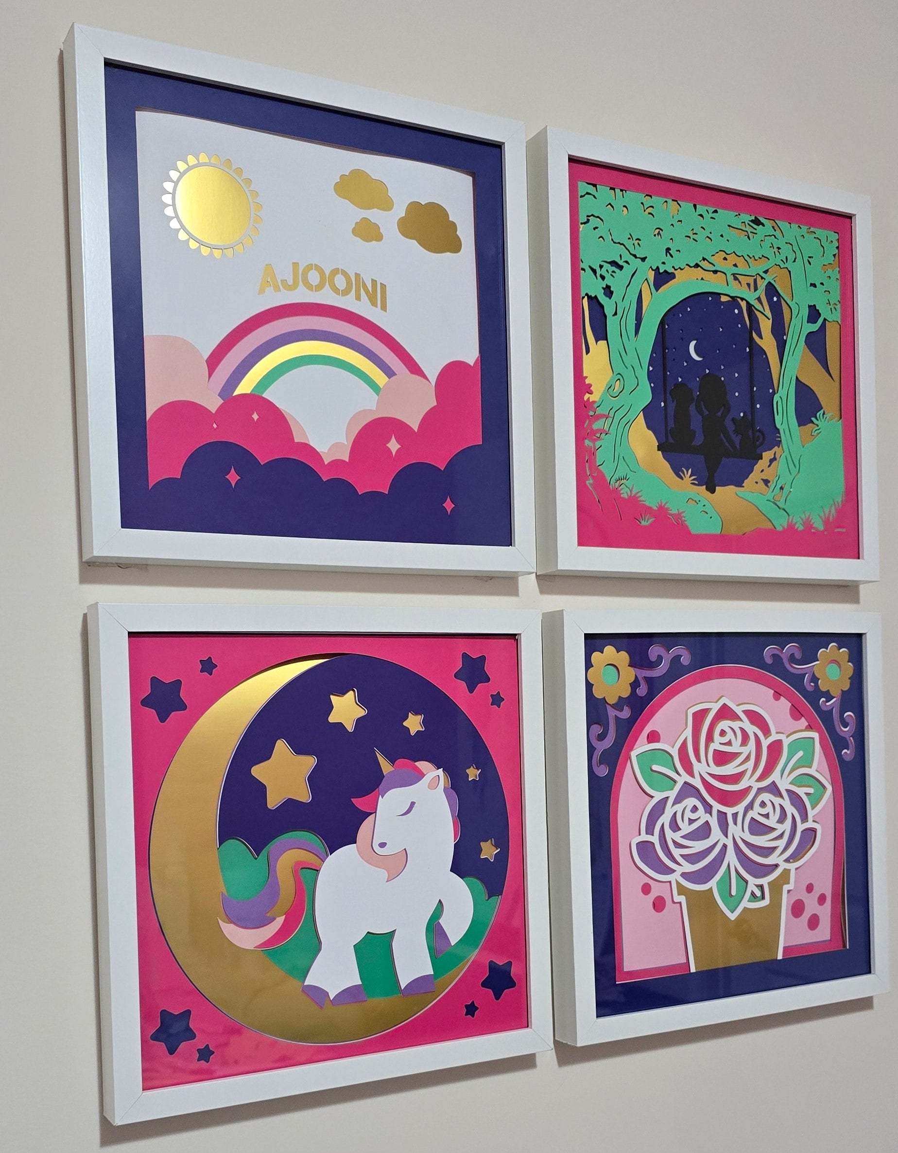 Four colorful greeting cards with different designs on a light gray background