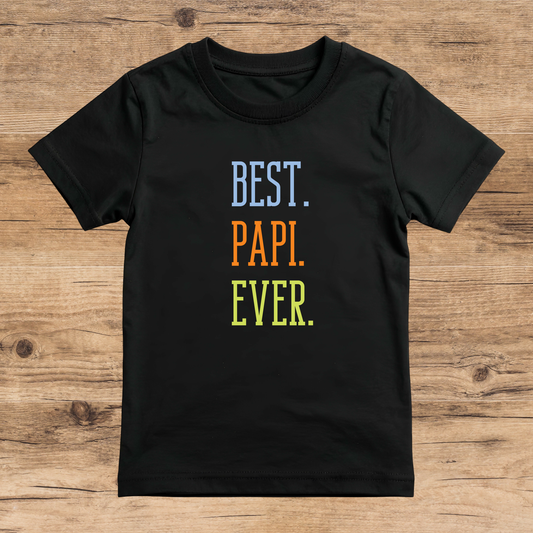 Black t-shirt with 'BEST. PAPI. EVER.' text on a wooden surface