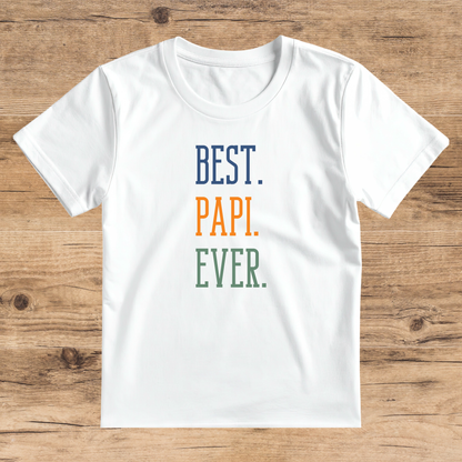 White t-shirt with 'BEST. PAPI. EVER.' text on a wooden surface