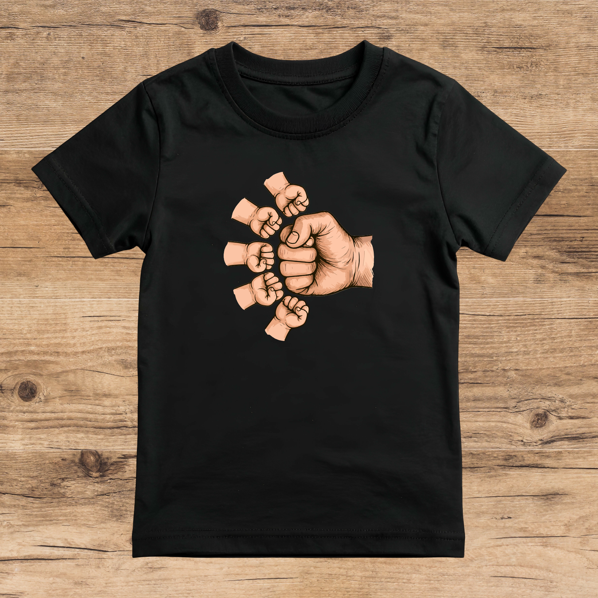 Black t-shirt with a graphic of interlocked hands on a wooden surface