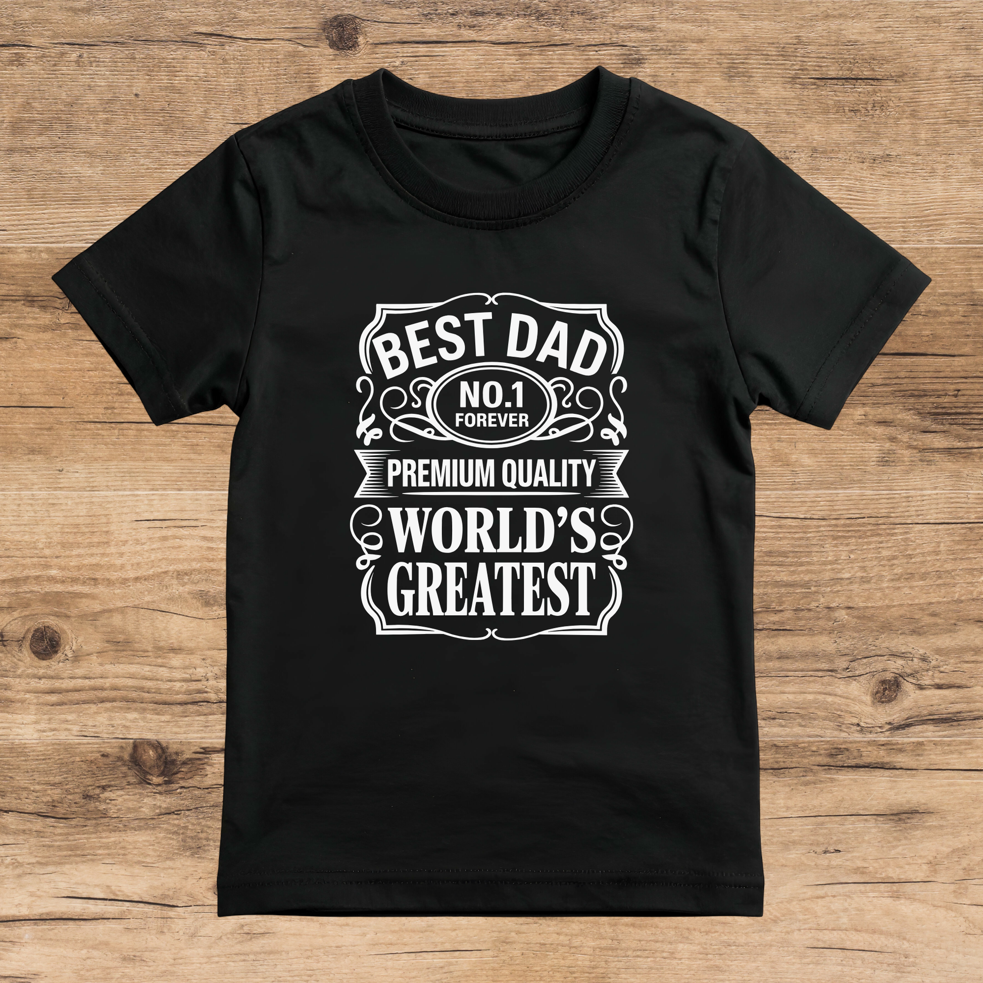 Black t-shirt with white text on a wooden surface