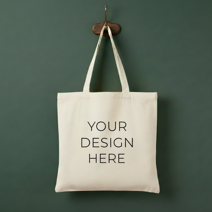 Beige tote bag with 'Your Design Here' text on a green background