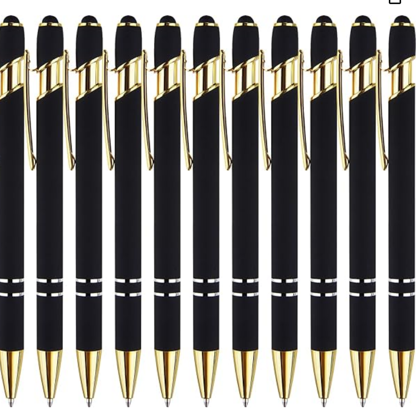 Row of black pens with gold accents on a white background