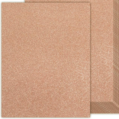 Two pieces of rose gold textured paper on a white background